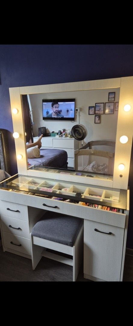 Dressing table (Category: Other Home Furniture) located in Singapore. Submitted by d_a_g (Listing ID 1460493486, Image 2). Description: White vanity table with large LED mirror and storage drawers. Includes grey stool. Perfect for makeup. * selling due too gonna give birth soon create more space *the glass top drawer has issue in pulling out can be repaired *Self collect at punggol please arrange your own transport.