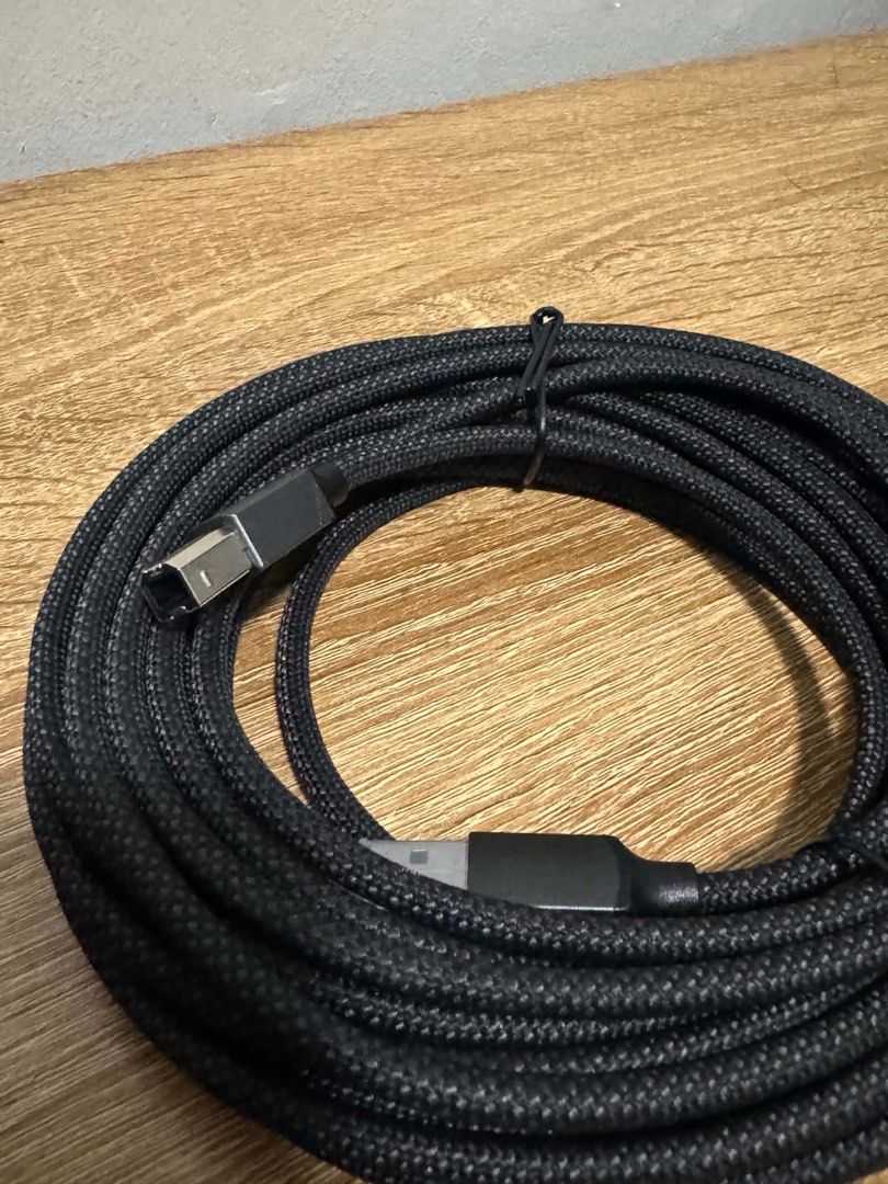 Vention Braided Printer Cable 5 meters (Category: Cables & Adaptors) located in Manila. Submitted by jjamcotton (Listing ID 1460489481, Image 2). Description: - Vention Braided USB Cable - Color: Black - Connector Type: USB-A to USB-B - Features: Durable braided exterior for enhanced longevity - 5 Meters - Ideal for: Printers, external hard drives, and other USB peripherals.