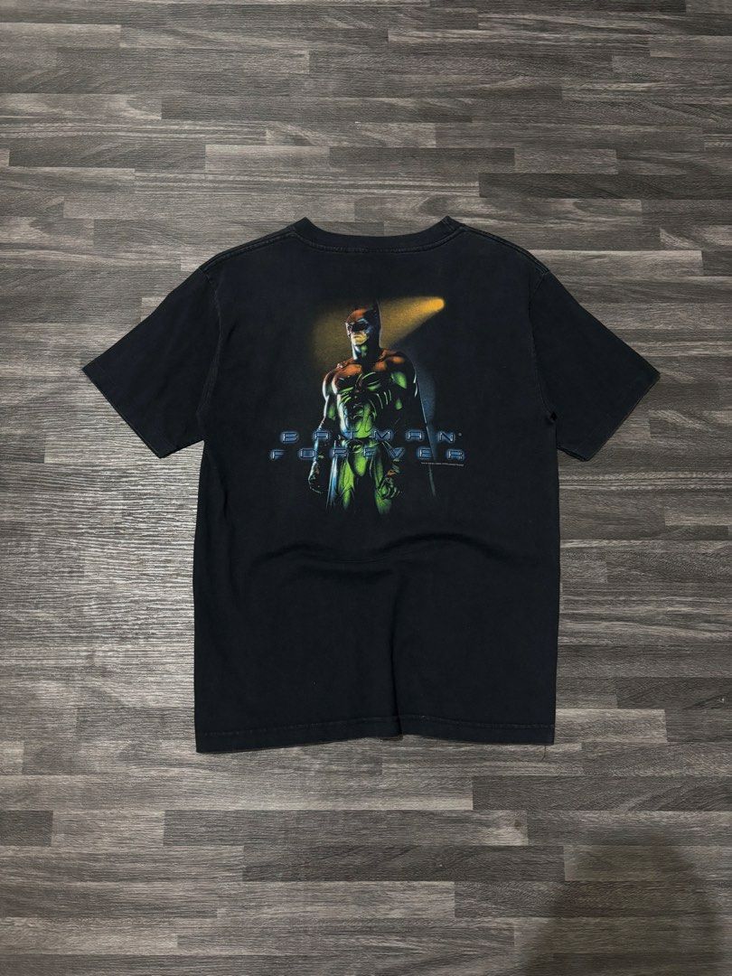 Vintage Batman Forever Dated 1995 Tee (Category: Tshirts & Polo Shirts ) located in Dipolog. Submitted by yougot.thrifted (Listing ID 1460321039, Image 1). Description: Issue white stain Need wash Excellent condition 9/10 color rate Size XL youth on tag Width 20” Length 27” Solid nito!.