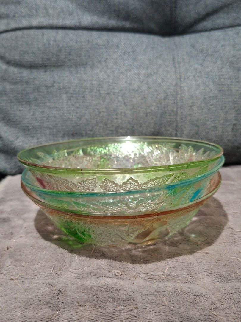 Vintage Glass Fruit Embossed Bowls Set (Category: Dinnerware & Cutlery) located in Taguig. Submitted by thrift_outlet.taguig (Listing ID 1460469365, Image 2). Description: 3 Kig Indonesia Colorful bowls 7 inches width - Set of unique vintage glass bowls - Features charming fruit and leaf imprints - Accents in green, blue, and pinkish-orange - Ideal for serving snacks or as decorative pieces - Sold as a complete set.