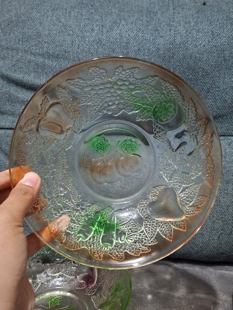 Vintage Glass Fruit Embossed Bowls Set (Category: Dinnerware & Cutlery) located in Taguig. Submitted by thrift_outlet.taguig (Listing ID 1460469365, Image 3). Description: 3 Kig Indonesia Colorful bowls 7 inches width - Set of unique vintage glass bowls - Features charming fruit and leaf imprints - Accents in green, blue, and pinkish-orange - Ideal for serving snacks or as decorative pieces - Sold as a complete set.