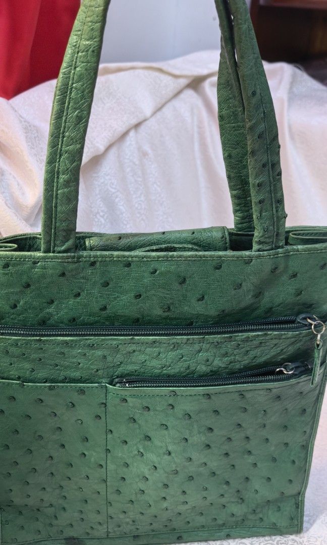 Vintage green Ostrich Hand bag (Category: Tote Bags) located in Tuguegarao City. Submitted by zenphoenix-7ad615 (Listing ID 1460357096, Image 2). Description: With multiple. Pocket PRETTY IN actual Real leather Ostrich handbag 11 by 11.5 by 3.5 inches.