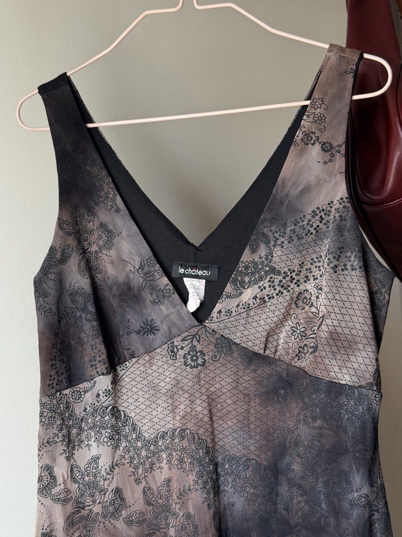 Vintage Midi Dress (Category: Dresses) located in Cebu City. Submitted by mayanng_12 (Listing ID 1460345235, Image 2). Description: - Le Chateau grey midi dress - V-neckline - Side slit for added flair -bias cut Size s-m.