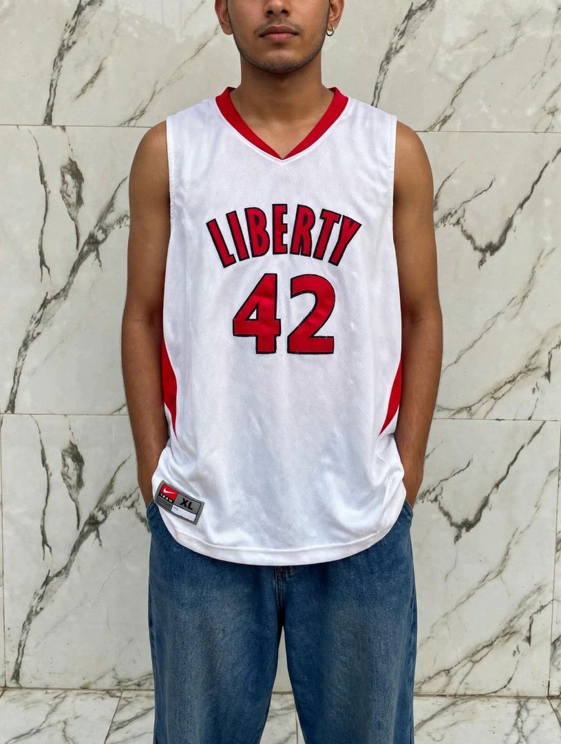 VINTAGE NIKE JERSEY (Category: Tshirts & Polo Shirts ) located in Pili. Submitted by jolobullac53657 (Listing ID 1460343194, Image 3). Description: WTS, VINTAGE NIKE LIBERTY JERSEY XL ON TAG.