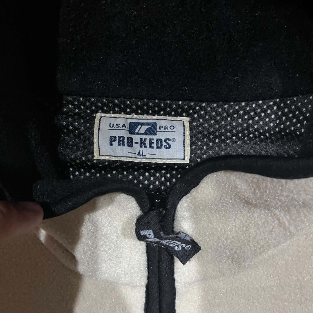 Vintage Pro-Keds Fleece Zip-Up Jacket (Category: Coats, Jackets and Outerwear) located in Pasig City. Submitted by mavsthrift (Listing ID 1460324665, Image 3). Description: - Cream-colored Pro-Keds fleece jacket - Size: 4L - Full zip closure - Black collar and trim - Two side pockets with zip closures - Embroidered Pro-Keds logo on chest -Dimes: 29" × 32" fit to L/XL - Condition: 8/10 Note: Shipping fee is additional. Feel free to ask! Ship via J
