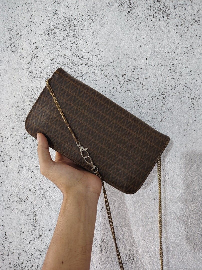 Vintage valentino monogram long wallet sling (Category: Luxury Bags & Wallets) located in Taguig. Submitted by castofffinds (Listing ID 1460354174, Image 3). Description: See pics for details outer part nya malinis naman sa loob lang may konting issue.