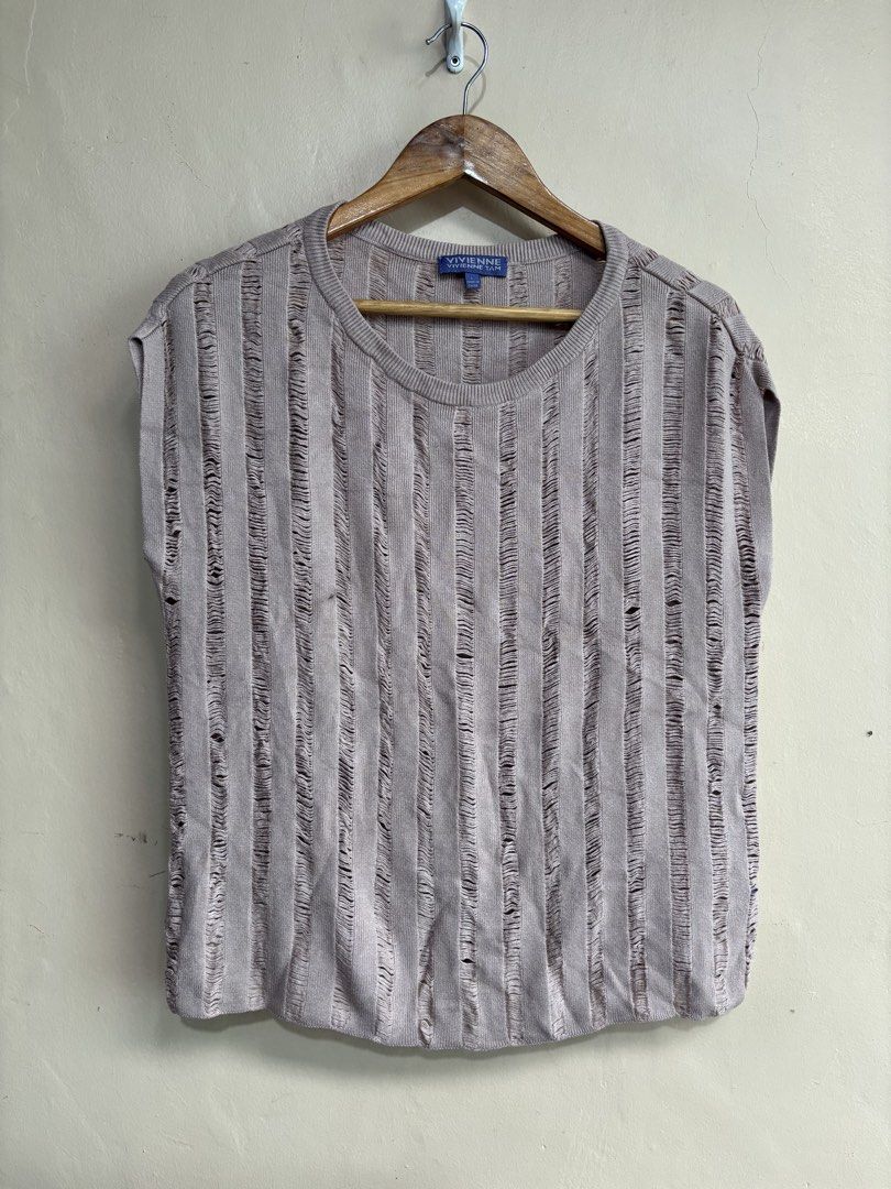 Vivienne Tam (Category: Luxury Apparel) located in Dasmarinas. Submitted by arthrthriftcop. (Listing ID 1460397237, Image 1). Description: Vivienne Tam distressed ladder-knit sleeveless top Authentic Size: Large Excellent Condition Need Wash No issue Actual measure by in, W20 in, pit to pit L22 in, Feel free to inquire quick replies.