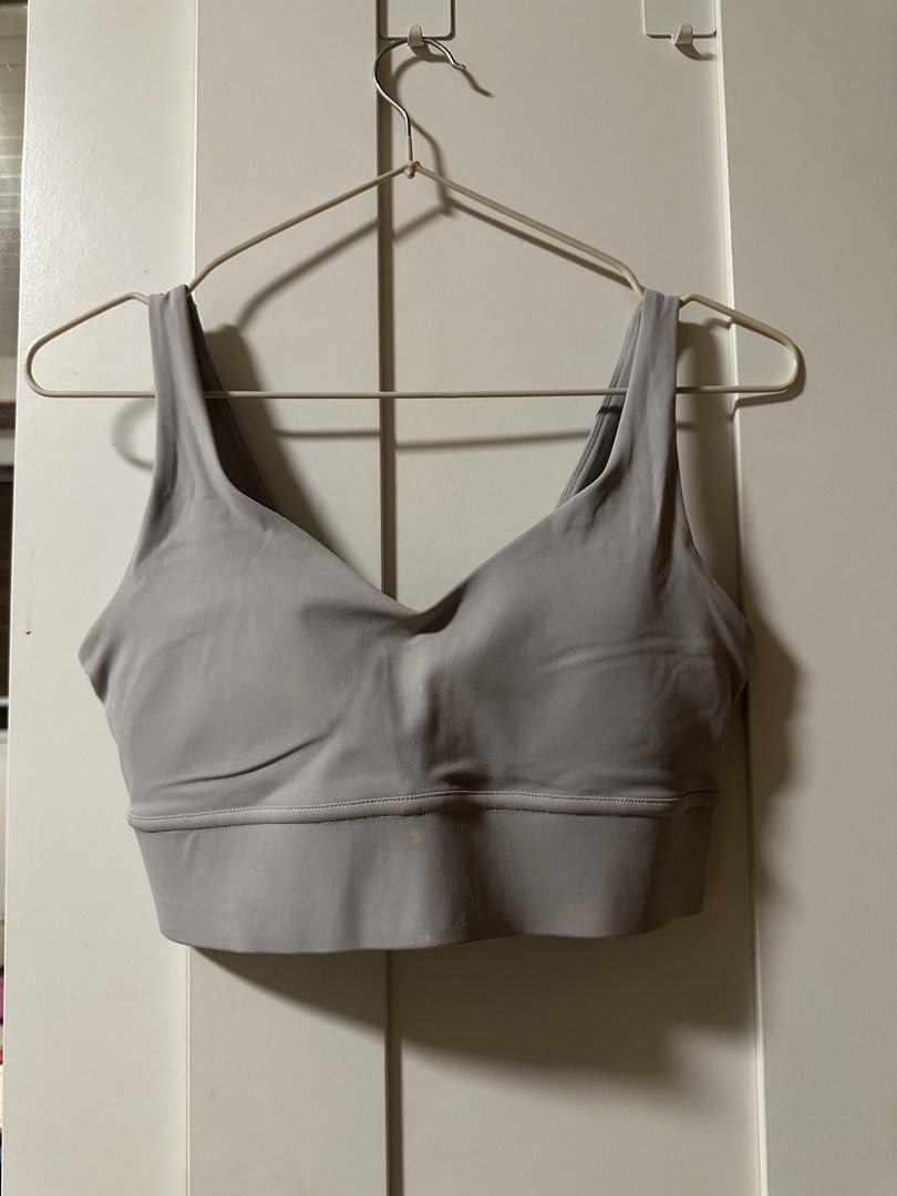 V-Neck Sports Bra (Category: Activewear) located in Malolos. Submitted by fituccine (Listing ID 1460418479, Image 1). Description: - Originally white but turned gray from wash - Comfortable and supportive design - Soft fabric for a pleasant feel - Wide band at the bottom for enhanced comfort - Ideal for workouts or everyday wear.