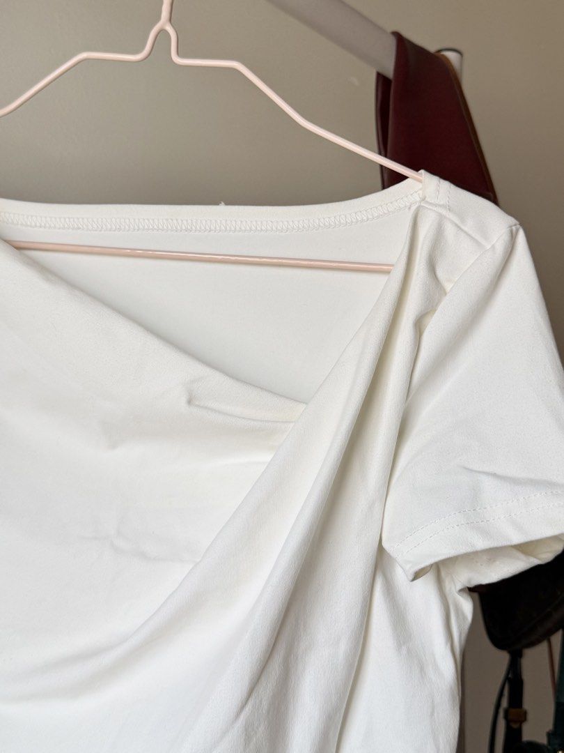 White Asymmetrical Top (Category: Blouses) located in Cebu City. Submitted by mayanng_12 (Listing ID 1460345819, Image 2). Description: Size s-m.