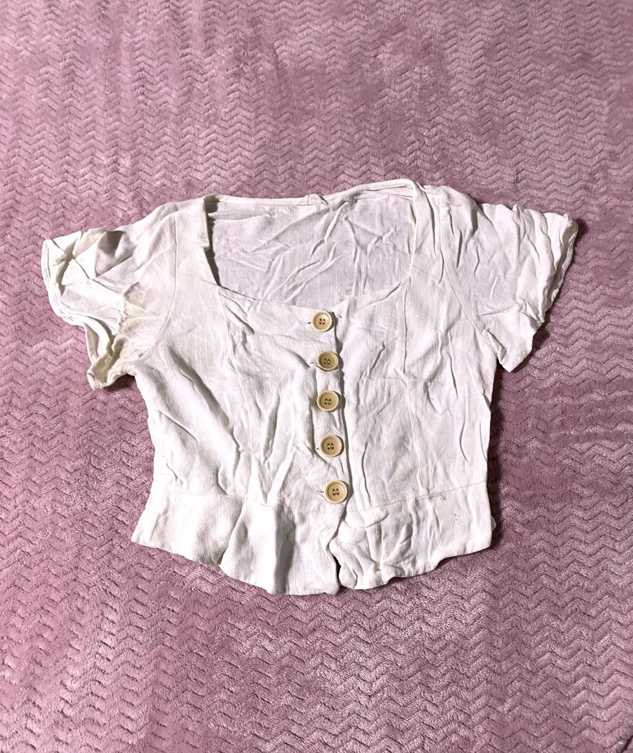 White button peplum top (Category: Blouses) located in Manila. Submitted by diorellecoeur_xxx02 (Listing ID 1460477332, Image 1). Description: May yellow stain dahil ang tagal natambak, washable naman I guess. Di cheapipay ang tela..