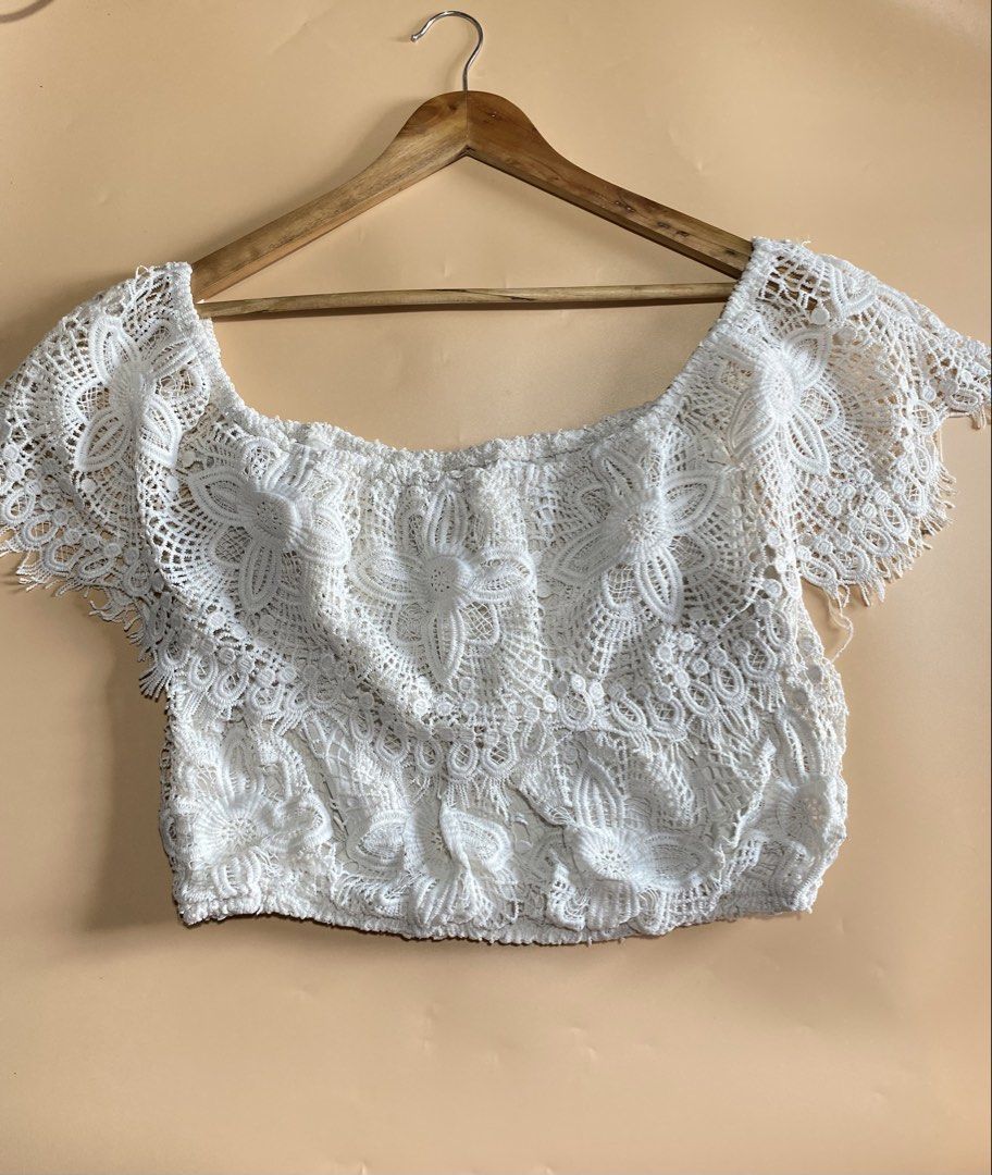 White Crochet Off-Shoulder Crop Top (Category: Others Tops) located in Talisay. Submitted by ks_things (Listing ID 1460414587, Image 1). Description: - Adorable white crochet crop top - Chic off-shoulder design - Comfortable short sleeves - Elasticated hem for a perfect fit - Fully lined for comfort - Ideal for summer days and beach vacations - Versatile: pairs easily with shorts or skirts -Size: M-L.