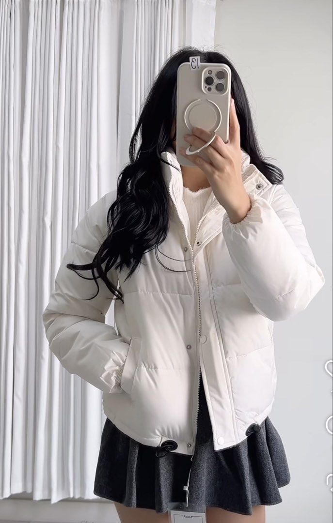 White Cropped Puffer Jacket (Category: Coats, Jackets and Outerwear) located in Cainta. Submitted by coatclosetph (Listing ID 1460414904, Image 2). Description: - Super cute white cropped puffer jacket - Zip-up front with button closure - Two convenient side pockets - Adjustable hem with toggles for a customized fit - Ideal for layering, pairs well with skirts or jeans -medium Cainta lo.