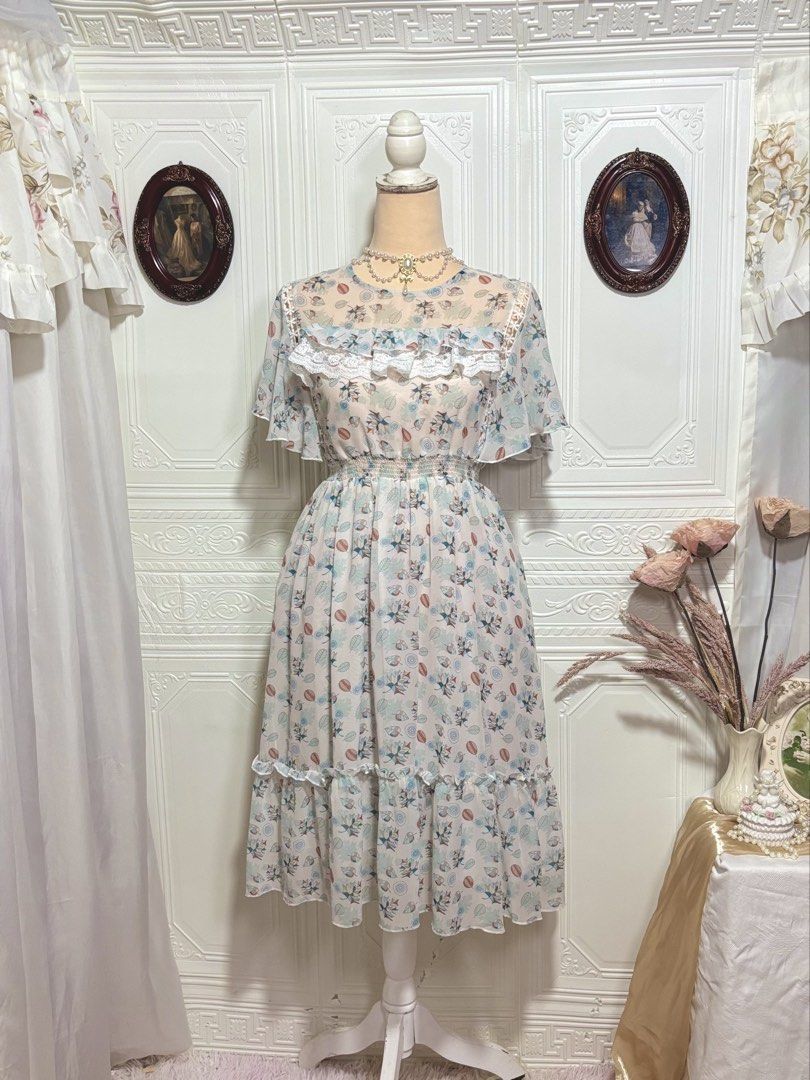 White Light Blue Printed Ruffled Midi Dress (Category: Dresses) located in San Jose. Submitted by vintagely_retro (Listing ID 1460499573, Image 1). Description: Lined bodice and skirt *may pasilip on the sides though 😅 Measurements Frame Medium Bust: 32-38” Waist: 28-30” Length: 47”.