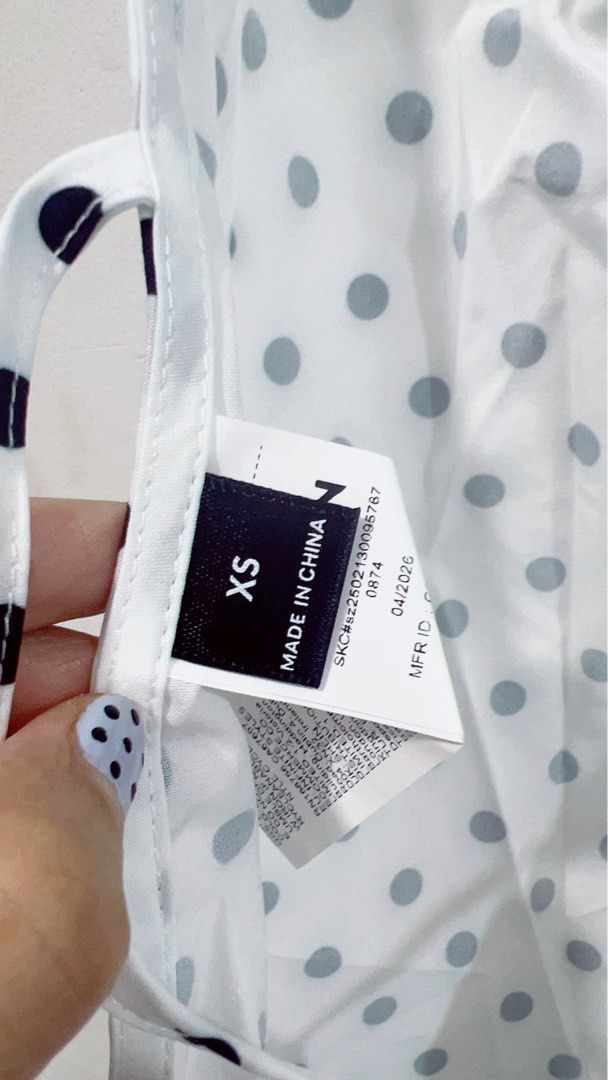 White Polka halter backless cowl top (Category: Others Tops) located in Cavite. Submitted by wishie_collects (Listing ID 1460424398, Image 3). Description: Brand new cowl neck Backless size Xs.