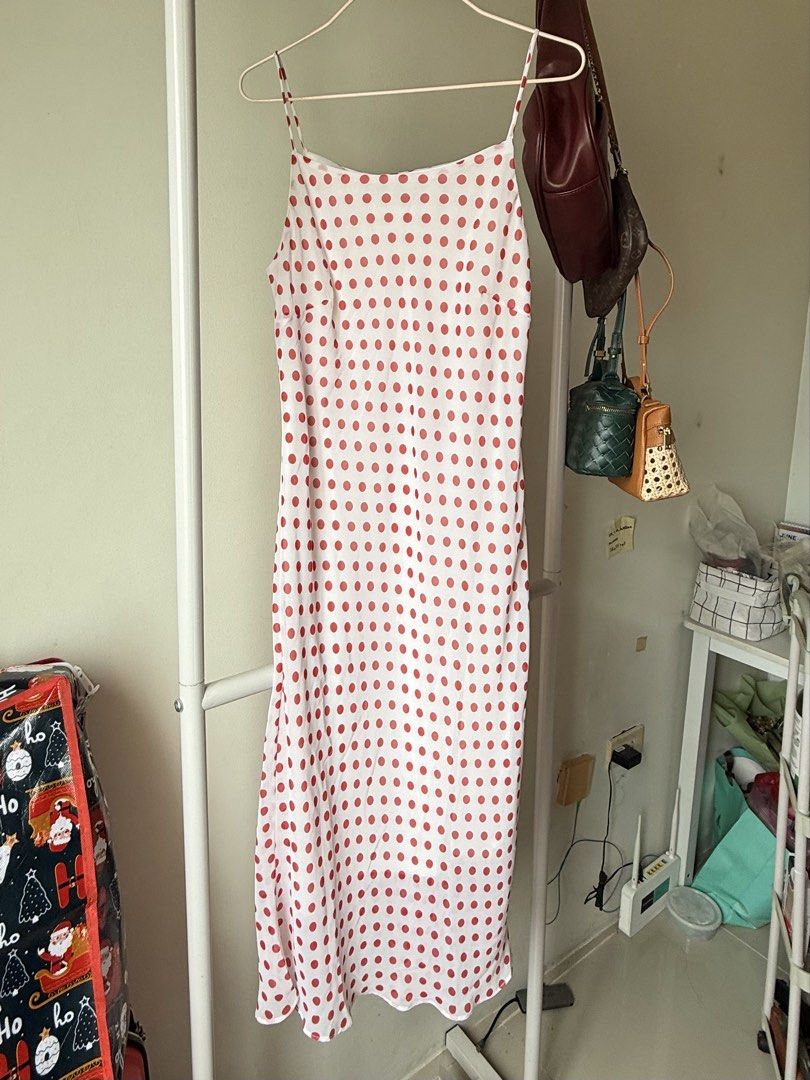 White Polka Dot Slip Dress (Category: Dresses) located in Cebu City. Submitted by mayanng_12 (Listing ID 1460344892, Image 1). Description: - Cute white slip dress - Red polka dot pattern - Midi length Size s-m.