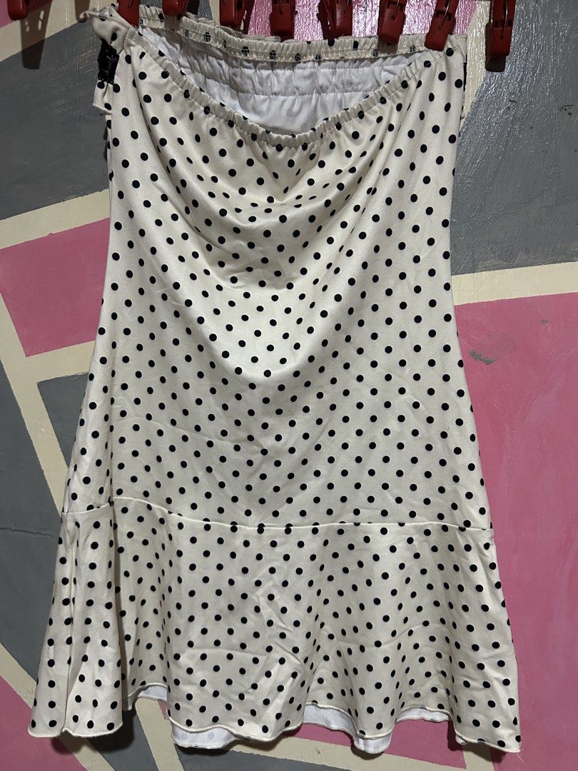 White Polka Dot Strapless Ruffle Dress (Category: Dresses) located in Manila. Submitted by prlvdbypau (Listing ID 1460397179, Image 3). Description: - Cute white dress with black polka dots - Strapless design with ruffled top edge - Ribbon tie detail down the front - Flared hemline - Ideal for a night out or party.