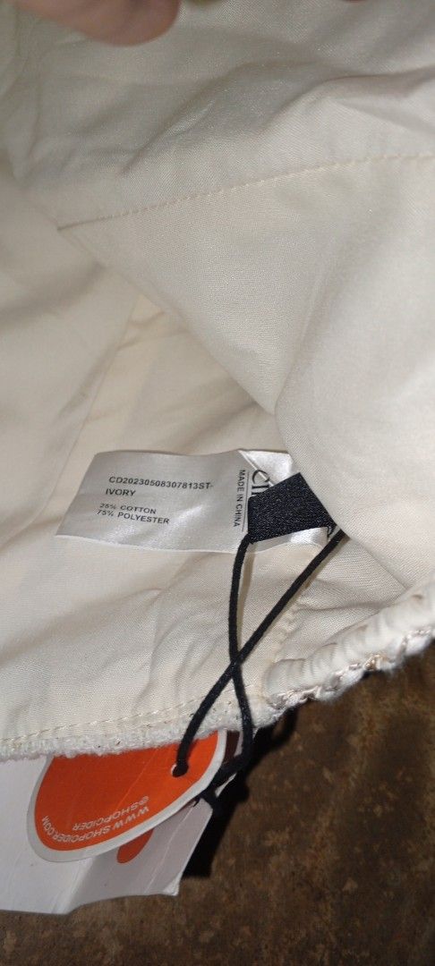 White Tweed Top with Black Trim (Category: Blouses) located in Manila. Submitted by ezekislacl02490 (Listing ID 1460421470, Image 3). Description: - White tweed sleeveless top - Black braided trim around neckline and armholes - Fully lined with smooth ivory fabric - Brand new with tag attached - Versatile for layering or wearing solo.