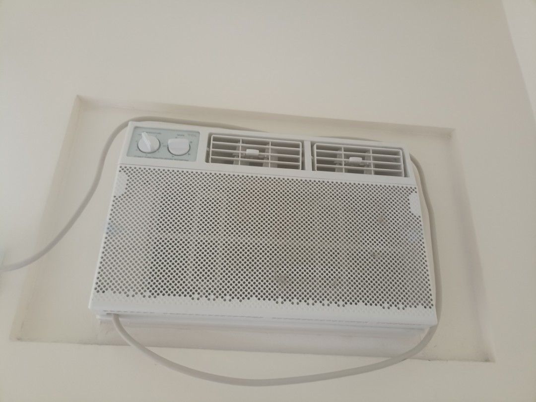 White Window Air Conditioner (Category: Air Conditioning and Heating) located in Quezon City. Submitted by racsprelovedselling (Listing ID 1460329681, Image 1). Description: - White window air conditioner unit - Easy-to-use control knobs on top - Visible front vents for air circulation - Includes attached power cord - Designed to fit standard window openings - Ideal for cooling single rooms.