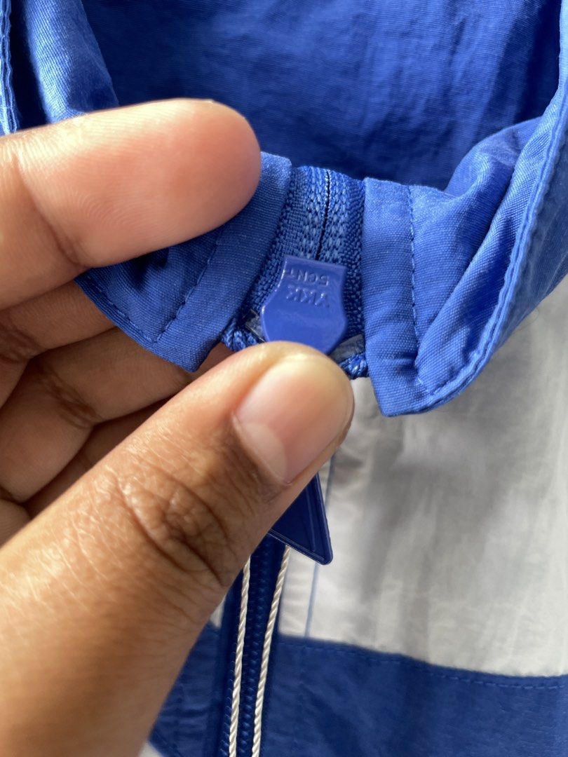 windbreaker cut tag (Category: Coats, Jackets and Outerwear) located in Manila. Submitted by kyleee_ld (Listing ID 1460391484, Image 2). Description: .