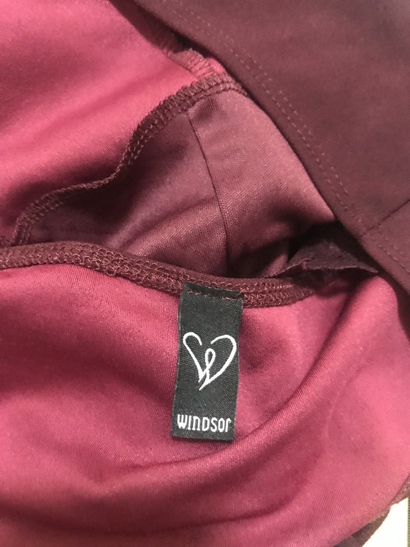 Windsor Burgundy Lace Back Zipper Bodysuit (Category: Others Tops) located in Manila. Submitted by airamef28.closet (Listing ID 1460424868, Image 3). Description: - Stunning burgundy bodysuit - Flattering deep V-neck front - Delicate spaghetti straps - Gorgeous circular lace panel on the back - Convenient zipper closure - Comfortable brief-style bottom - Versatile for layering or as a standalone piece.