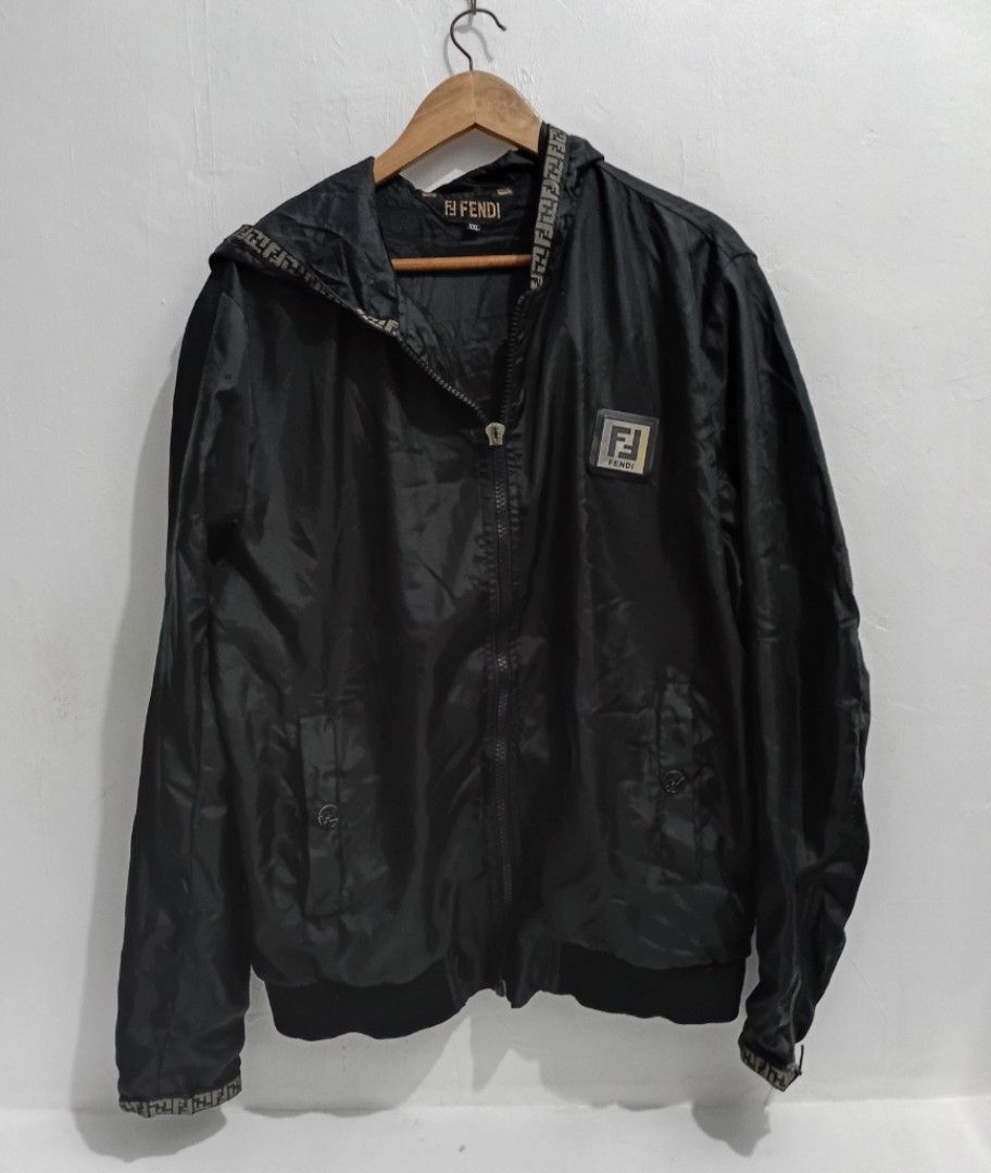 Y2K FENDI ZUCCA WINDBREAKER (Category: Luxury Apparel) located in Navotas City. Submitted by ms.soulana (Listing ID 1460414829, Image 1). Description: PREOWNED WellUsed Y2K Fendi ZUCCA Windbreaker /Rain Zip Jacket -black - Size: Large -Unisex - Features iconic FF monogram tape on hood, back, and cuffs - Includes Fendi FF Monogram Mini Crossbody Bag - Perfect set for any Fendi enthusiast - Please check photos for detailed condition Bought in Japan