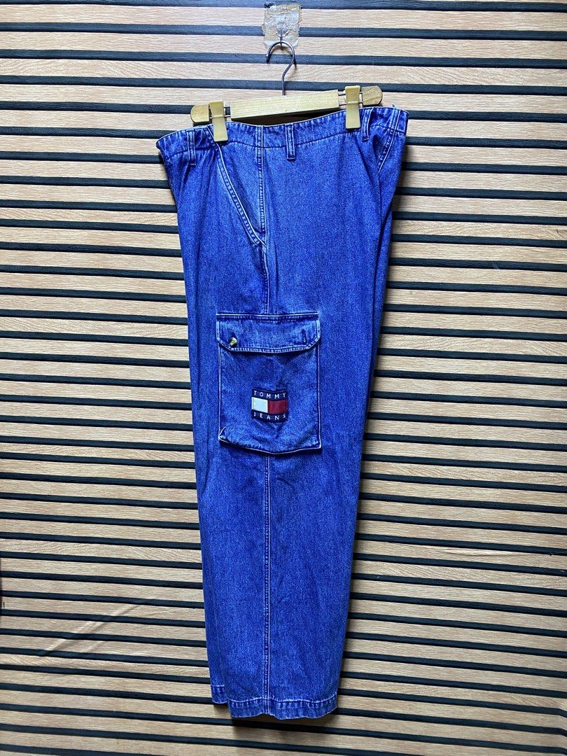 Y2K Tommy Jeans blue denim cargo pants (Category: Jeans) located in Makati City. Submitted by drip.poww (Listing ID 1460468378, Image 1). Description: - Authentic Tommy Jeans - Color: Blue Denim - Size: Large to XL - Dimes: W: 36 L: 43 LH: 13 - Authentic - Excellent condition - Need wash, fresh from bale - Material: 100% Cotton Please don’t expect too much—these are thrifted (ukay) items. 😊 !!STILL NEGOTIABLE!!.