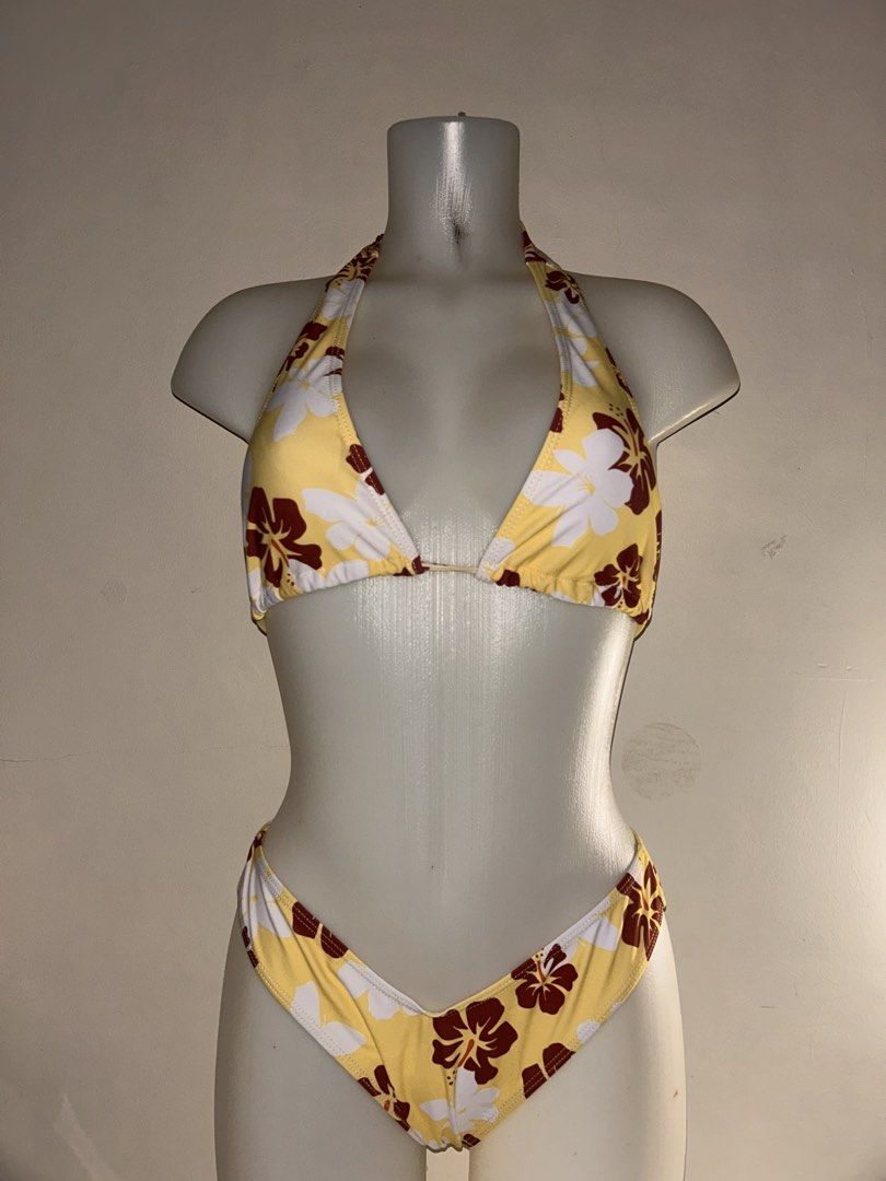 Yellow Floral Bikini Set (Category: Bikinis & Swimsuits) located in Legazpi City. Submitted by pinkysushie (Listing ID 1460418866, Image 1). Description: - Adorable yellow bikini with a charming floral print. - Features delicate white and maroon flowers. - Halter neck top with adjustable tie for a perfect fit. - Comes with matching bikini bottoms. - Ideal for beach trips, pool parties, or your next vacation!.