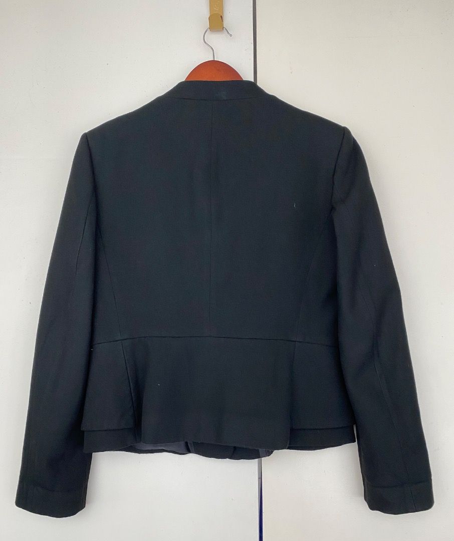 Zara Basic Black Peplum Blazer (Category: Coats, Jackets and Outerwear) located in Makati City. Submitted by roseaiscloset (Listing ID 1460383248, Image 3). Description: - Zara Basic Black Blazer - Collarless design - Flattering peplum hem - Single button closure - Sharp look for work or going out - Measurements: Shoulder 15", Armpit 18-19", Length 21-22" - Essential staple piece for any wardrobe.