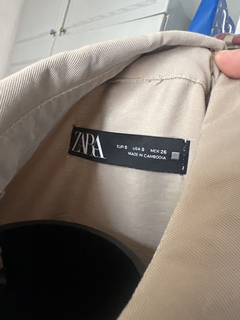 Zara Beige Utility Shirt Jacket Size S (Category: Coats, Jackets and Outerwear) located in Caloocan City. Submitted by 4mscloset (Listing ID 1460369450, Image 2). Description: - Zara beige utility shirt jacket - Button-up front with chest pockets - Drawstring waist for adjustable fit - Cuffed sleeves (can be rolled up) - Small mark on the back near the collar - Ideal for layering.