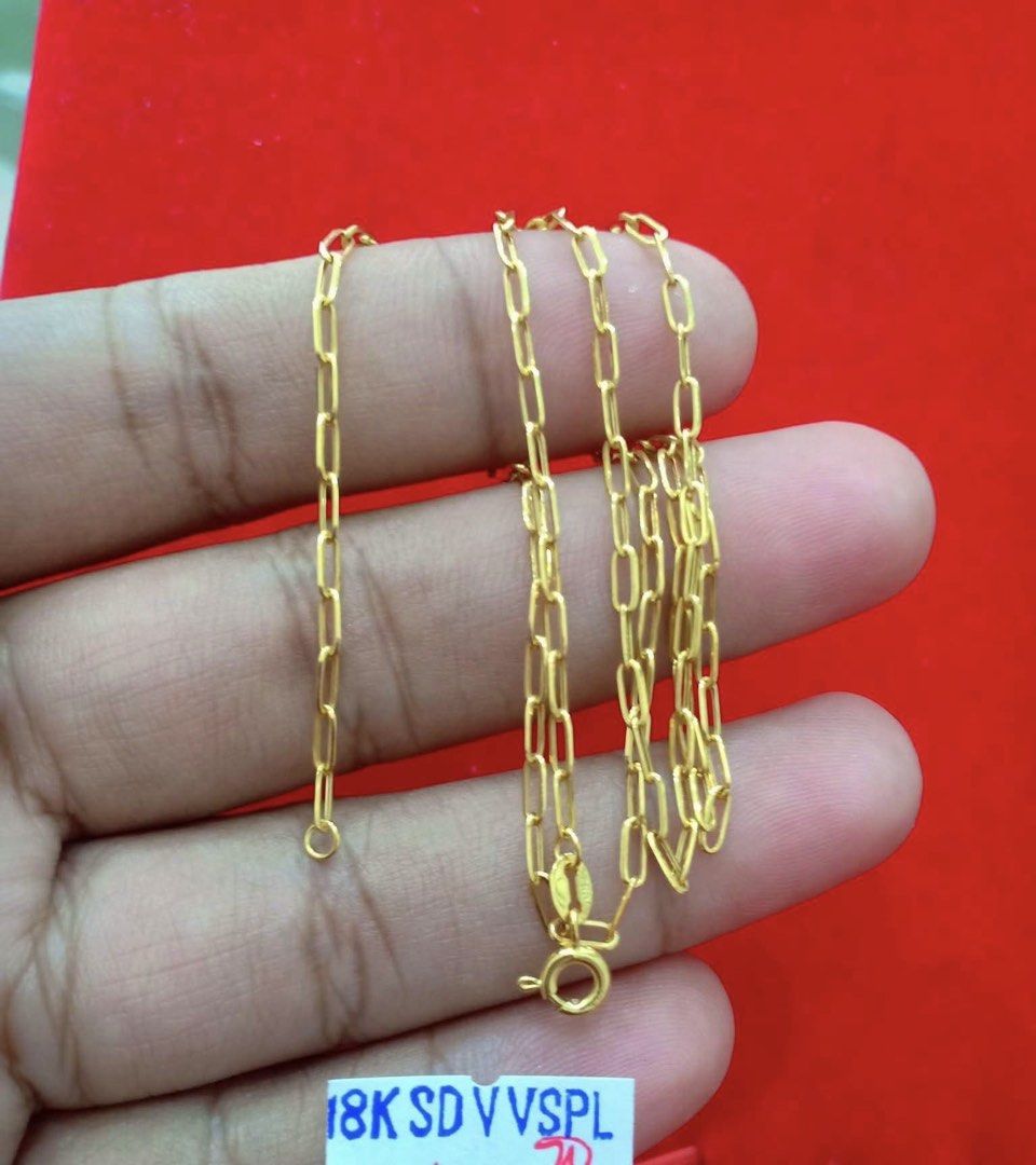 18K Gold Chain Necklace (Category: Necklaces) located in Mandaluyong City. Submitted by xmile (Listing ID 1460593713, Image 2). Description: - Genuine 18K gold chain necklace - Stylish paperclip link design - Delicate and perfect for everyday wear - Ideal for layering with other necklaces - Secure spring ring clasp - Presented in a beautiful pink jewelry box.