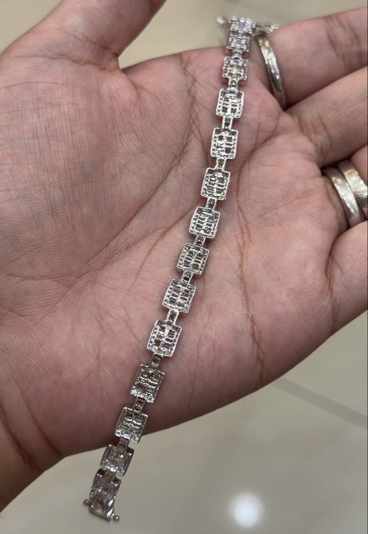 18K White Gold Illusion Diamond Bracelet (Category: Bracelets) located in Las Pinas. Submitted by houseofgems0 (Listing ID 1460542494, Image 2). Description: Details: - 18K White Gold | 9.4 grams - Size: 7 - 272 round and 265 baguette-cut natural diamonds - Total Carat Weight: 3ct stamped - PRICE: ₱110,000 💎 All items are 100% AUTHENTIC/PAWNABLE. 💎 LAYAWAY AVAILABLE 4 months no interest. Send us a message to inquire..
