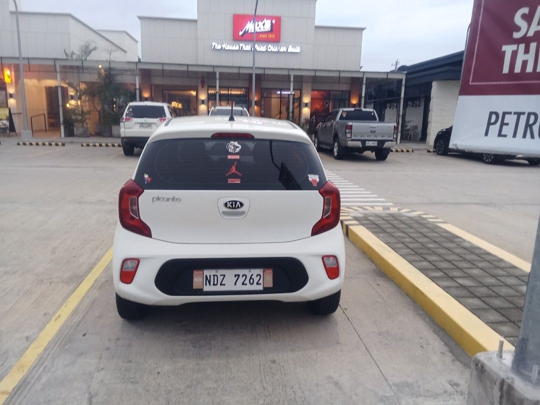 2021 kia picanto (Category: Used Cars) located in Taguig. Submitted by hoots_ (Listing ID 1460679266, Image 3). Description: 2021 kia picanto lx a/t automatic mid variant 1.0 liter gas engine no issues never flooded casa maintaned 1st owner complete papers insurance with acts of God pristine condition like new no to low ballers engine 90% body 90% intetior 95% last price 380k used but not abused low mileage 26k plus only.