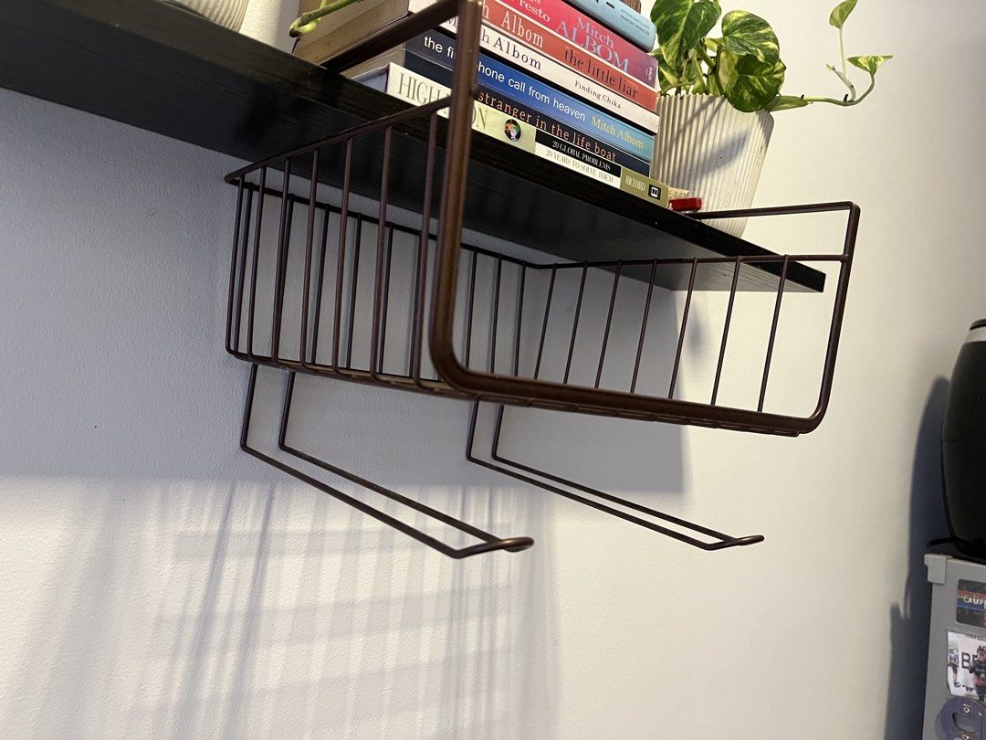 2 pcs Under Shelf Wire Storage Basket with Hooks (Category: Storage Boxes & Baskets) located in Manila. Submitted by closetperfection (Listing ID 1460664082, Image 2). Description: - Maximize your space with this under-shelf wire basket. - Ideal for organizing small items like spices, cleaning supplies, or accessories. - Features convenient hooks on the bottom, perfect for hanging mugs, utensils, or dish towels. - Sleek black metal finish complem