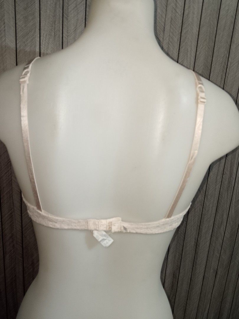 34a cream Lace Trimmed Triangle Bra (Category: Undergarments & Loungewear) located in Manila. Submitted by truecrystal-1407 (Listing ID 1460644574, Image 2). Description: - Soft, creamy white bra - Delicate lace trim on band and cups - Adjustable straps for a comfortable fit - Triangle cup style - Perfect for everyday wear and layering.