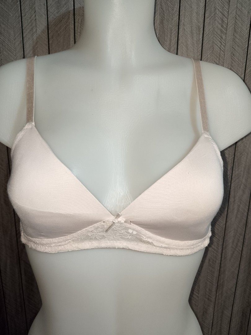 34a cream Lace Trimmed Triangle Bra (Category: Undergarments & Loungewear) located in Manila. Submitted by truecrystal-1407 (Listing ID 1460644574, Image 1). Description: - Soft, creamy white bra - Delicate lace trim on band and cups - Adjustable straps for a comfortable fit - Triangle cup style - Perfect for everyday wear and layering.
