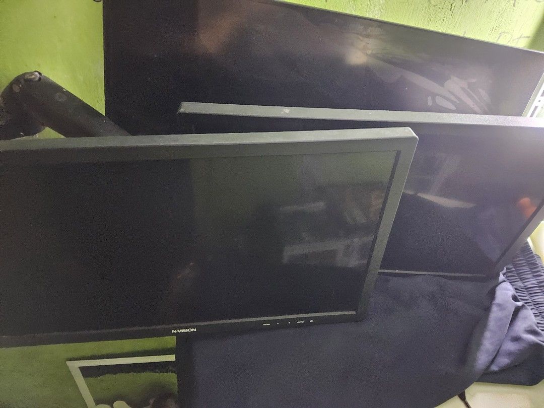 3 Set N-Vision Computer Monitor (Category: Desktops) located in Taguig. Submitted by roninsoju (Listing ID 1460526839, Image 1). Description: big monitor is broken, 2 small nvision monitors have lines or is glitchy (got wet) but still displays.