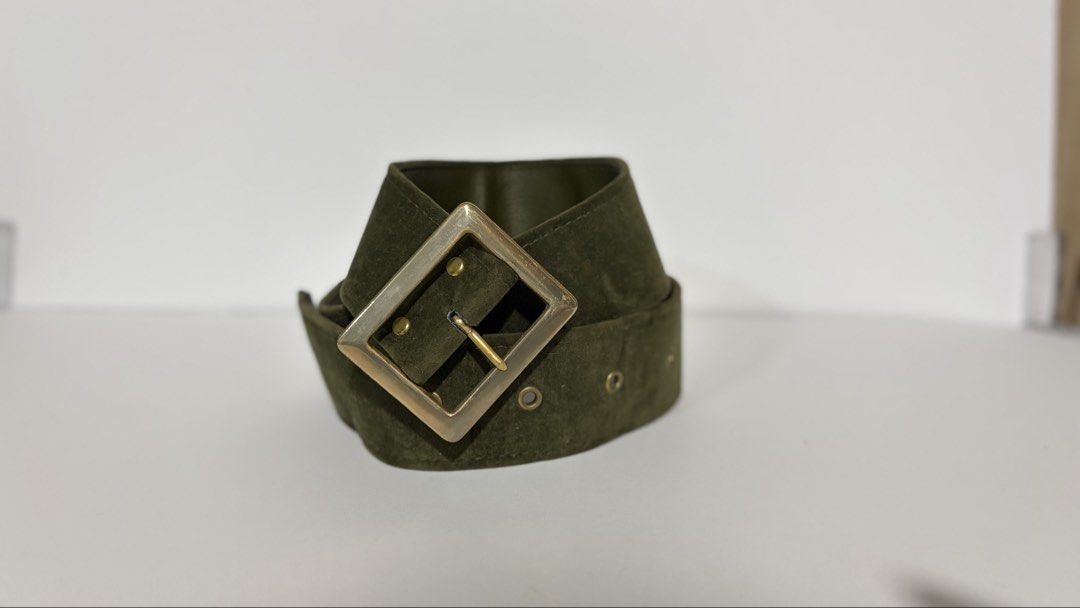 8. Army Green Leather Belt (Category: Belts) located in Quezon City. Submitted by wagwagan_ukay_blues (Listing ID 1460658404, Image 2). Description: ❗️color may vary due to lightings ❗️please expect signs of usage From Japan in good condition hole size- 24” - 27” width - 1.5” overall - 31” .