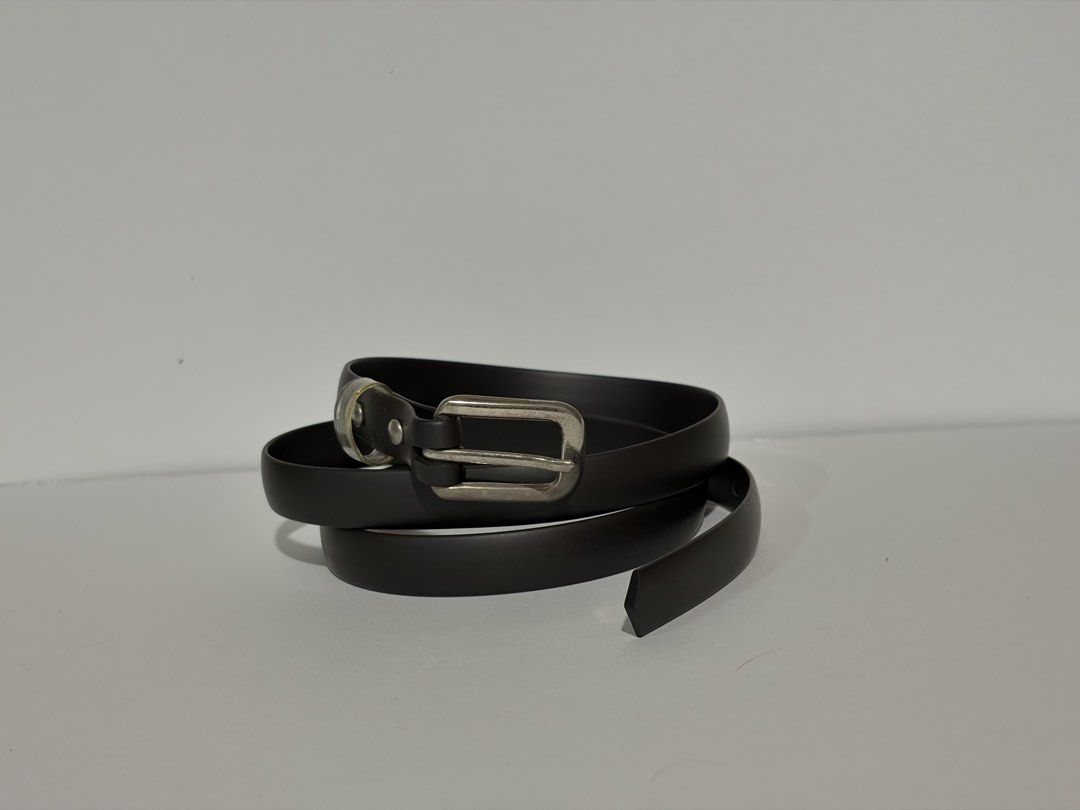 8. Black Slim Plastic Belt (Category: Belts) located in Quezon City. Submitted by wagwagan_ukay_blues (Listing ID 1460664129, Image 3). Description: from Japan in good condition ❗️please expect signs of usage hole size - 29” -33” width -.5” overall -37”.