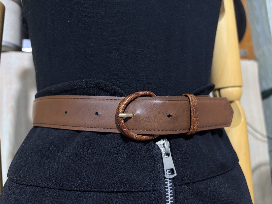 8. Brown Leather Belt 44 (Category: Belts) located in Quezon City. Submitted by wagwagan_ukay_blues (Listing ID 1460659919, Image 2). Description: ❗️color may vary due to lightings ❗️please expect signs of usage from Japan in good condition hole size - 26” -29” width -1.1” overall - 33”.