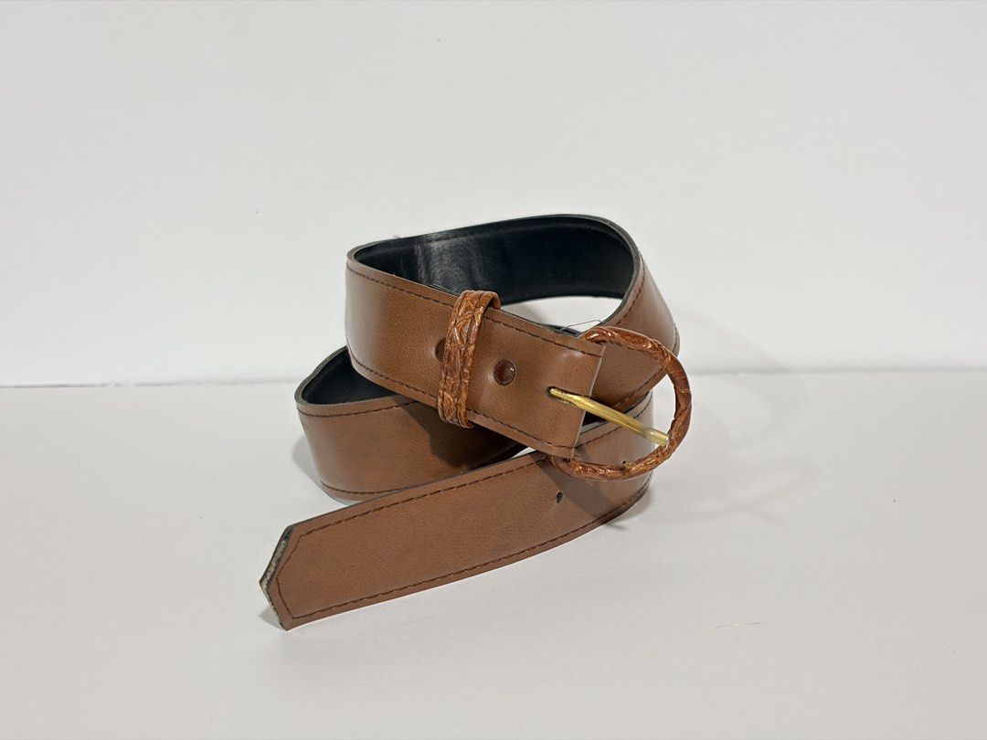 8. Brown Leather Belt 44 (Category: Belts) located in Quezon City. Submitted by wagwagan_ukay_blues (Listing ID 1460659919, Image 3). Description: ❗️color may vary due to lightings ❗️please expect signs of usage from Japan in good condition hole size - 26” -29” width -1.1” overall - 33”.