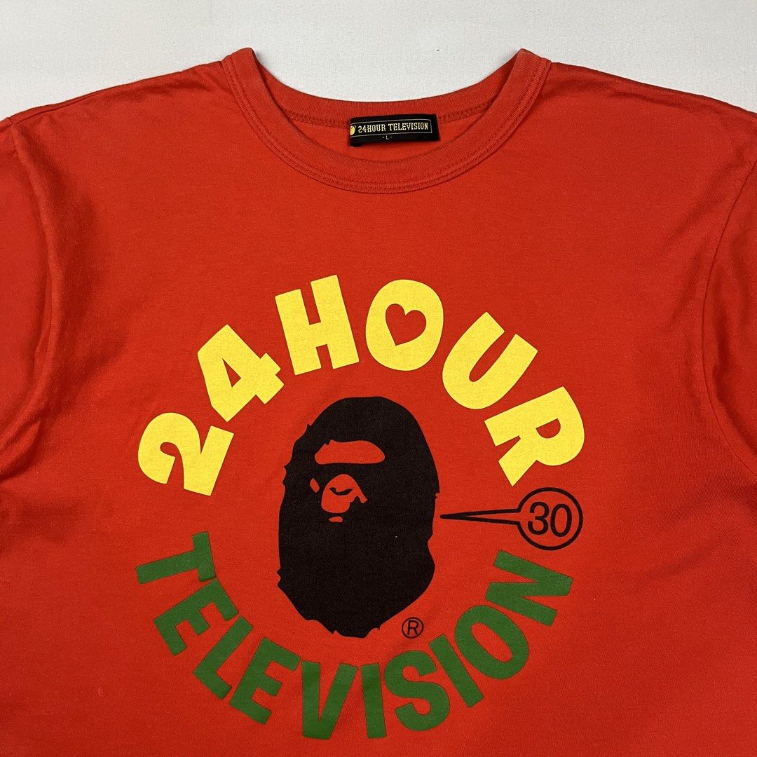 A Bathing Ape x 24 Hour Television Tee (Category: Tshirts & Polo Shirts ) located in Puerto Princesa. Submitted by paradise5300 (Listing ID 1460538540, Image 3). Description: A Bathing Ape x 24 Hour Television Tee Tagged Size: Large Dimensions Inches length: 26 Inches width: 19 Condition: Excellent Color rate: 10 Flaws: None 1,399 shipping fee is not yet included. .