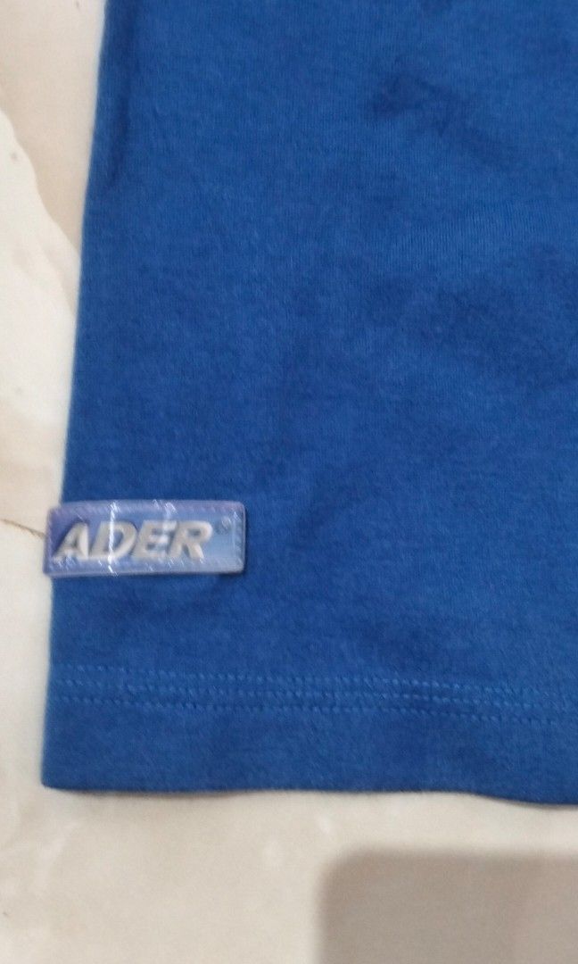 Ader Error Blue Crewneck (Category: Luxury Apparel) located in Rizal, Mindoro Occidental. Submitted by thrift.finds_5103 (Listing ID 1460612920, Image 3). Description: This is an Ader Error blue 2020 Spring/Summer long-sleeve graphic t-shirt featuring a chest logo print and layered sleeve detail. Dimes: 26x 30 Location: Occidental Mindoro South Luzon Philippines 5103.