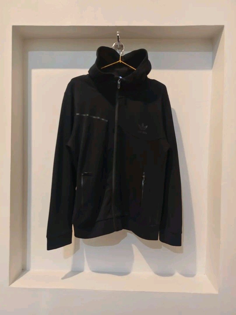 Adidas Black Full Zip Hoodie Jacket (Category: Coats, Jackets and Outerwear) located in Caloocan City. Submitted by clprelovedclothing (Listing ID 1460665919, Image 1). Description: - Classic black Adidas zip-up hoodie - Features iconic Adidas logo on the chest - Equipped with convenient zippered pockets - Ideal for both casual outings and athletic activities - Offers comfort and a stylish look.