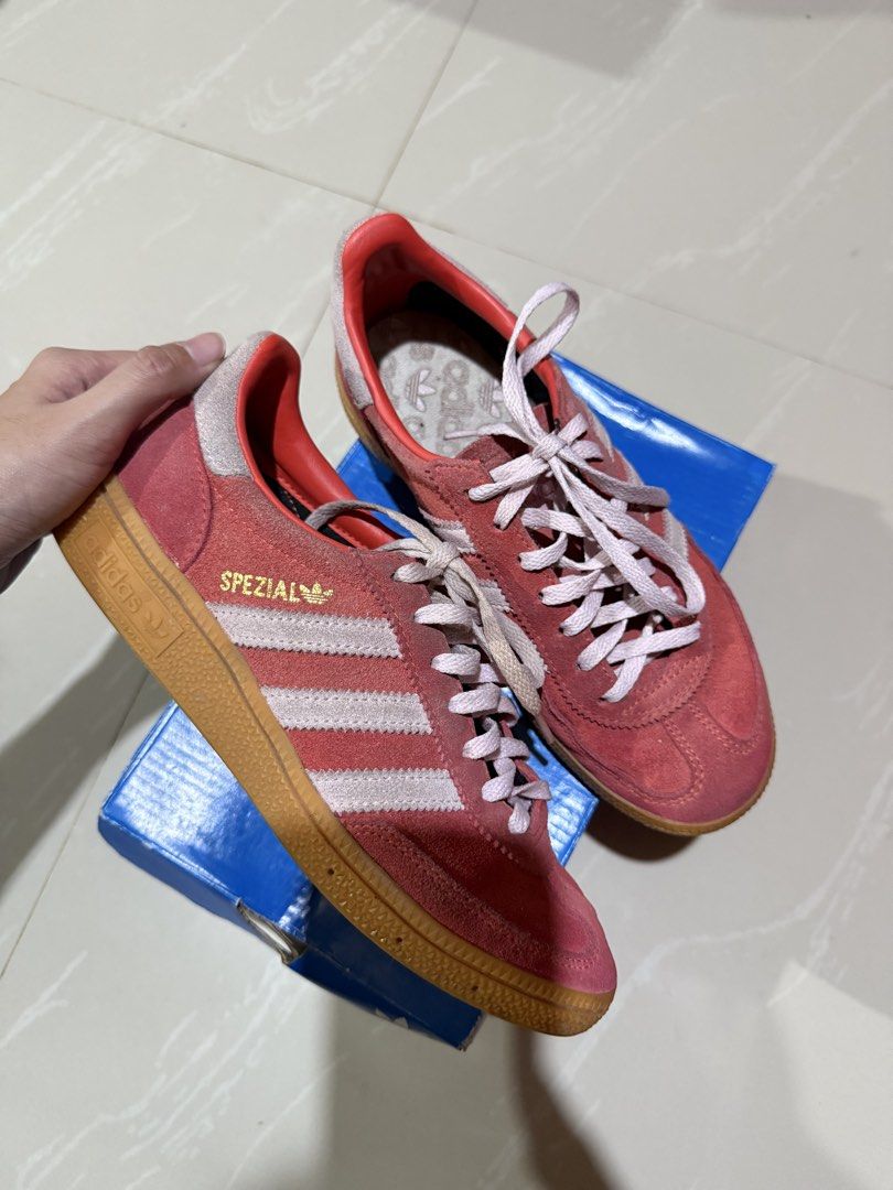 Adidas Handball Spezial Red / Pink (Category: Sneakers) located in Manila. Submitted by akiii222 (Listing ID 1460652114, Image 2). Description: Original Adidas Handball Spezial Red/Pink US 6W with extra red shoe lace never been used used needs cleaning lang talaga since suede material bought it from adidas online with screenshot of receipt. Loc: Laguna J&T / Lalamove.