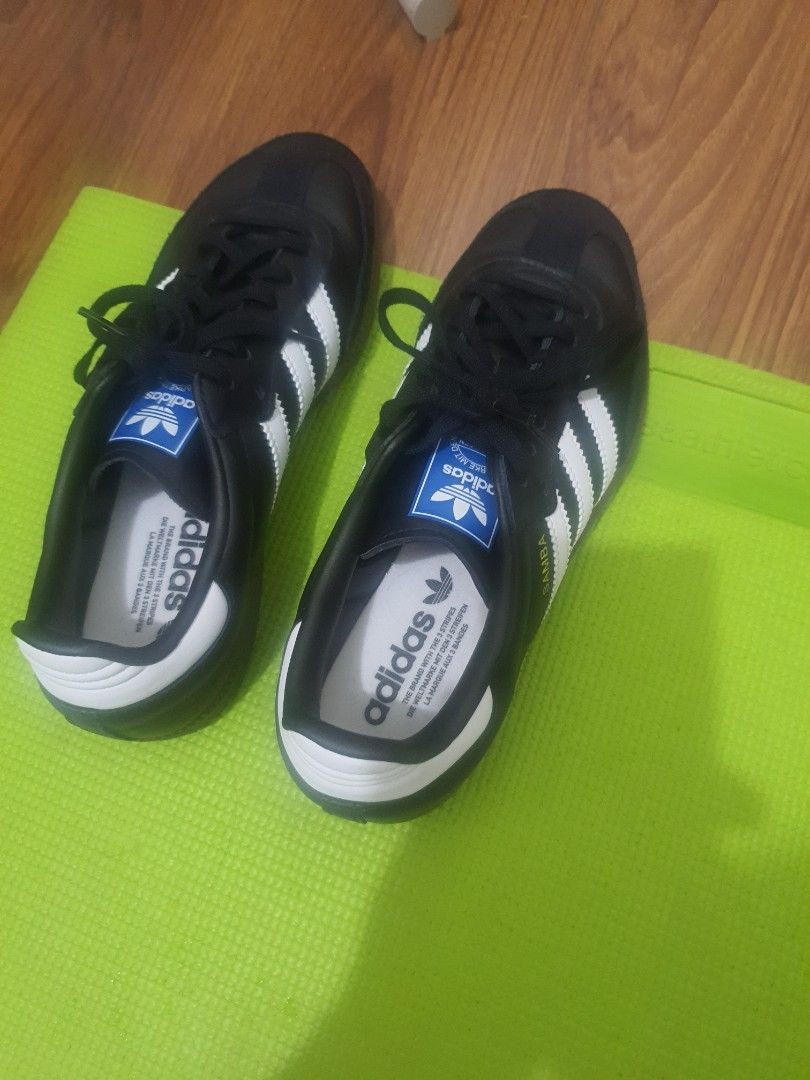 Adidas Samba Black White Sneakers (Category: Sneakers) located in Quezon City. Submitted by coolhorse.5862d3 (Listing ID 1460687339, Image 1). Description: - Classic black Adidas Samba sneakers - Iconic white stripes - Versatile for casual wear or sports - Comfortable and stylish design - Ready for a new owner.