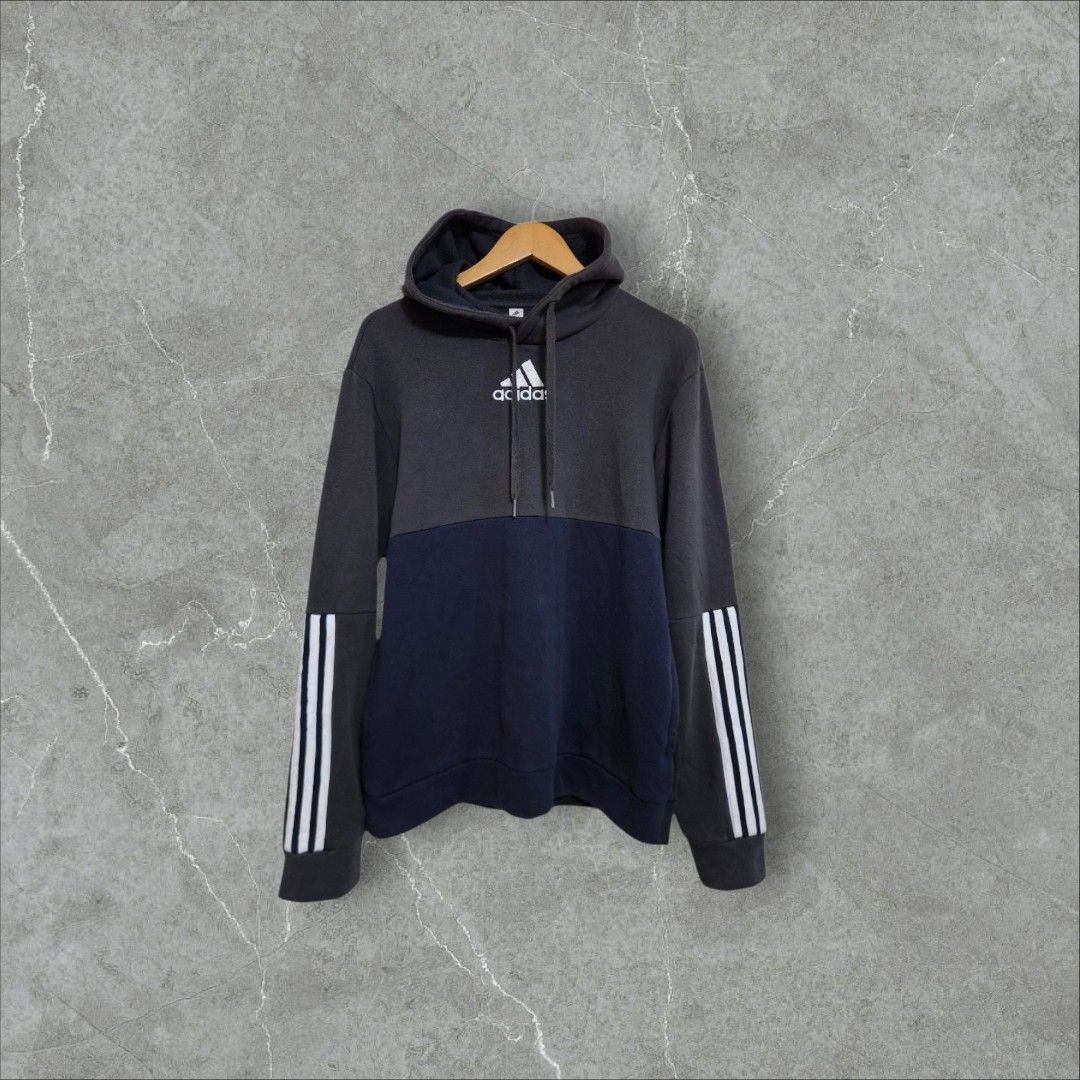 Adidas two tone hoodie (Category: Coats, Jackets and Outerwear) located in Baguio. Submitted by fadexquisite (Listing ID 1460520349, Image 1). Description: Adidas two tone hoodie Small fits med 27x21 Excellent condition Issue pinhole at hood 400 plus ship fee.