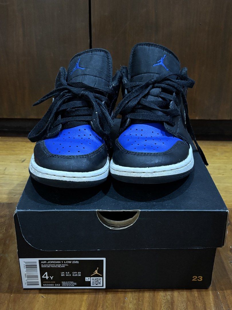 Air Jordan 1 Low (GS) (Category: Babies & Kids Fashion) located in Pasig City. Submitted by modernbazaar (Listing ID 1460582305, Image 2). Description: Air Jordan 1 Low Black/White-Game Royak 4Y 23cm.