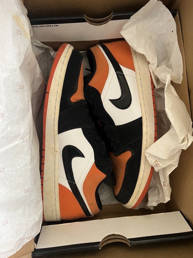 Air Jordan 1 Low Shattered Backboard (Category: Sneakers) located in Manila. Submitted by mjaquila30 (Listing ID 1460535071, Image 1). Description: - Air Jordan 1 Low sneakers - Classic Black, White, and Orange colorway - Original box included - A must-have for any sneaker collection 2x used kaso naimbak for 3 years..