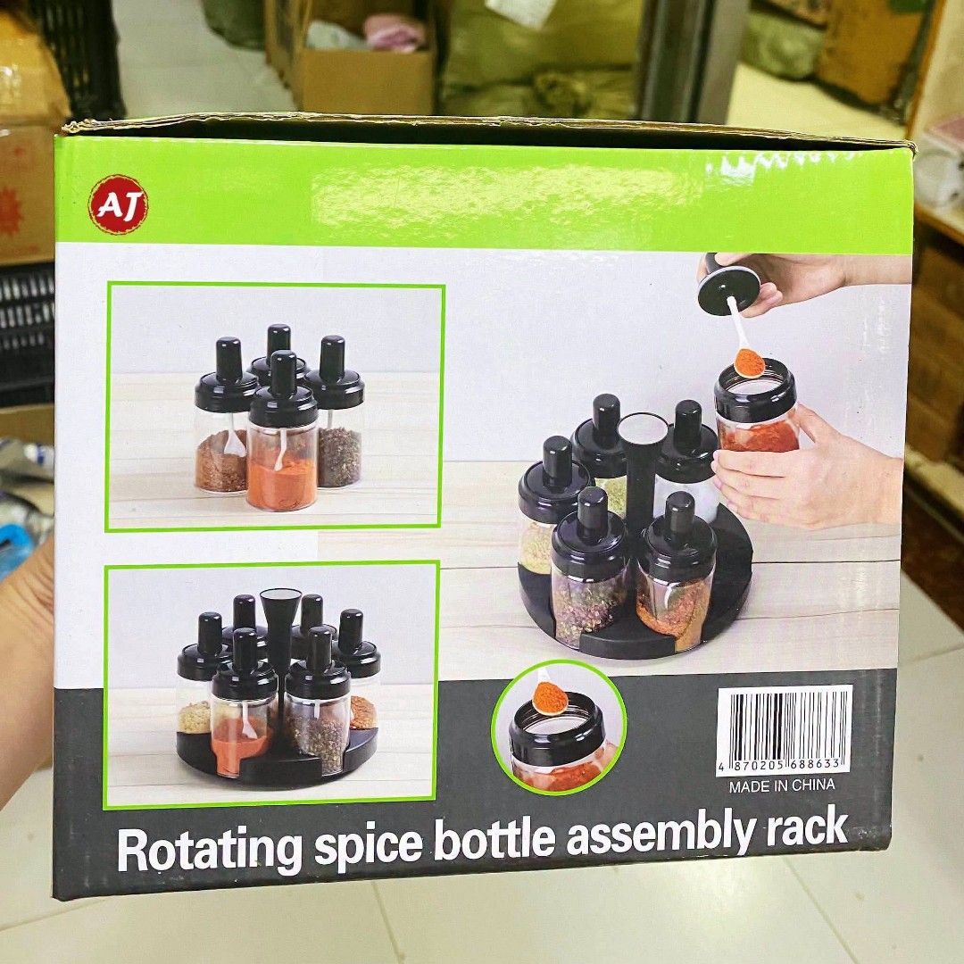 AJ Spice Rotating Bottles Assembly Rack JM-620 (Category: Food Organization & Storage) located in Manila. Submitted by chaionlineshop (Listing ID 1460535205, Image 3). Description: - Rotating spice bottle assembly rack - Includes 6 bottles with spoons - Perfect for organizing your spices - Keeps your kitchen neat and tidy - Easy to spin and access seasonings - Made in China.