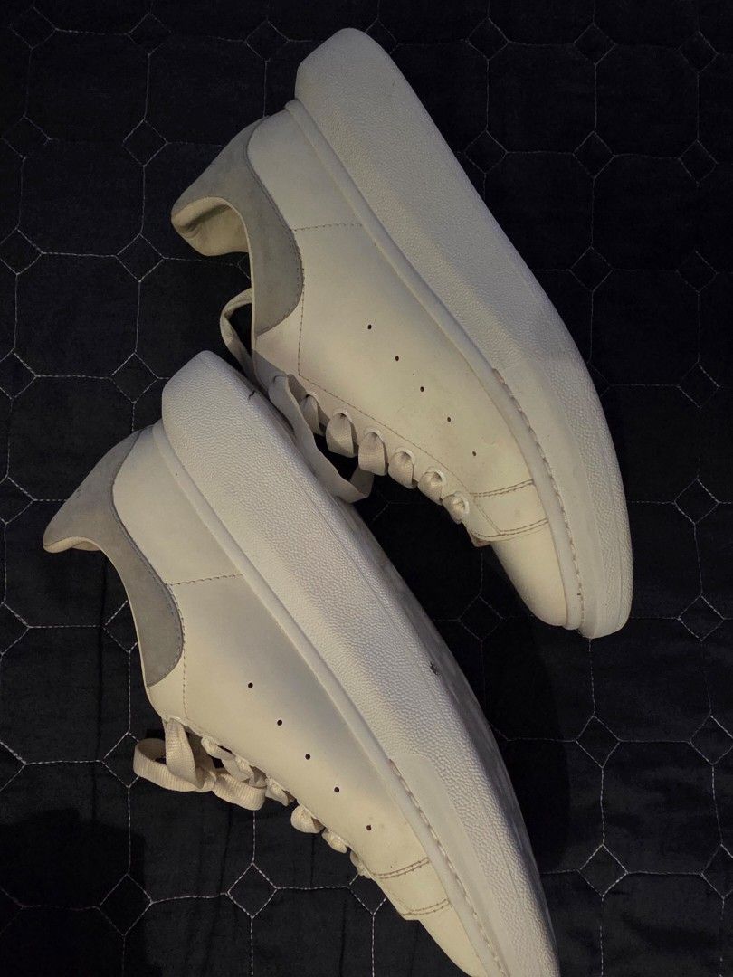 Alexander McQueen Oversized Sneakers White Grey Suede (Category: Sneakers) located in Quezon City. Submitted by jek017 (Listing ID 1460535209, Image 2). Description: - Authentic Alexander McQueen oversized sneakers - Color: White and Grey - Materials: Leather and Suede - Closure: Lace-up - Features: Chunky sole - Style: Perfect for making a statement.